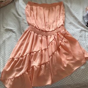 Strapless asymmetrical hem dress from the buckle.